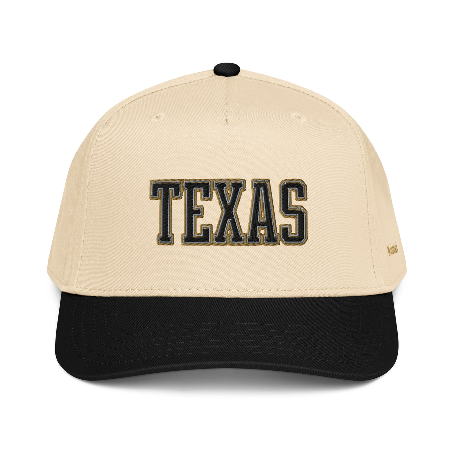 Two-tone cream and black Texas embroidered cap featuring gold-outlined typography and Worldmark logo — vintage heritage style.