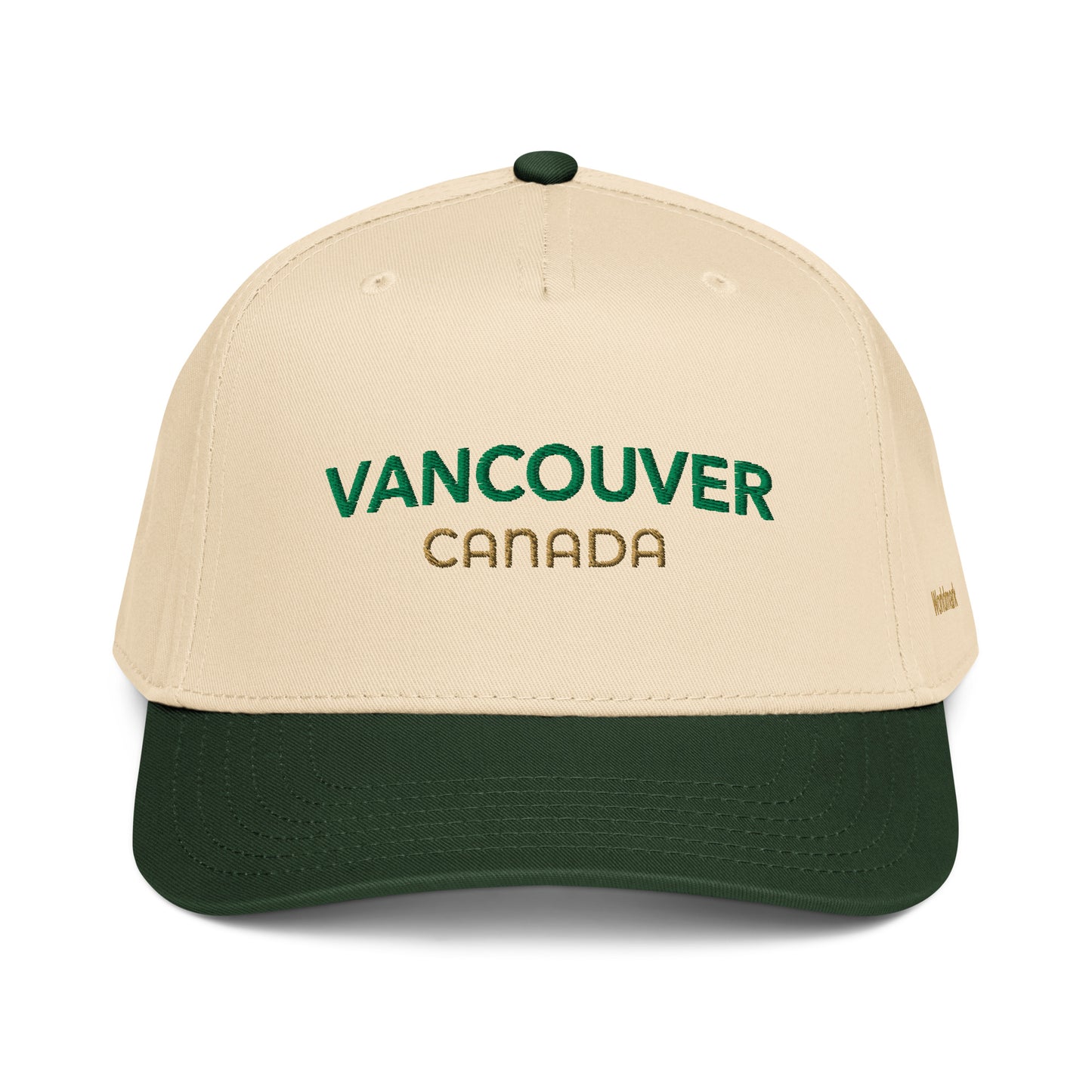 Two-tone cream and forest green Vancouver embroidered cap featuring gold “Canada” text and Worldmark logo — inspired by Canada’s natural beauty.