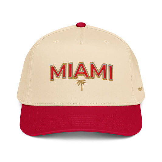 Two-tone cream and red Miami embroidered cap featuring gold palm tree and Worldmark logo — summer beach style design.