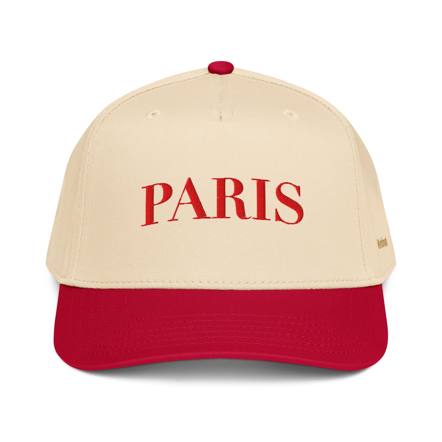 Two-tone cream and red Paris embroidered cap featuring minimalist serif typography and gold Worldmark logo — French chic style.