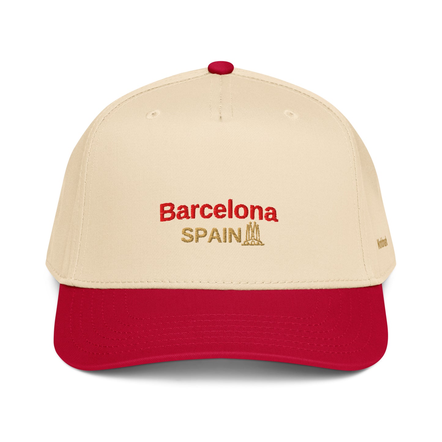 Two-tone cream and red Barcelona embroidered cap featuring gold “Spain” text and Sagrada Familia icon — inspired by Spain’s artistic heritage.