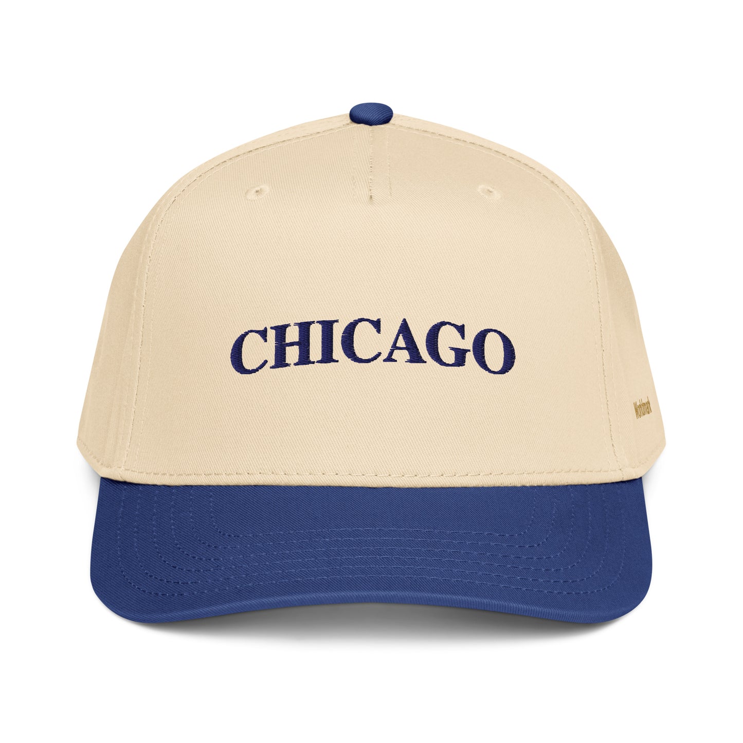 Two-tone cream and navy Chicago embroidered cap featuring minimalist serif typography and gold Worldmark logo — inspired by the Windy City.